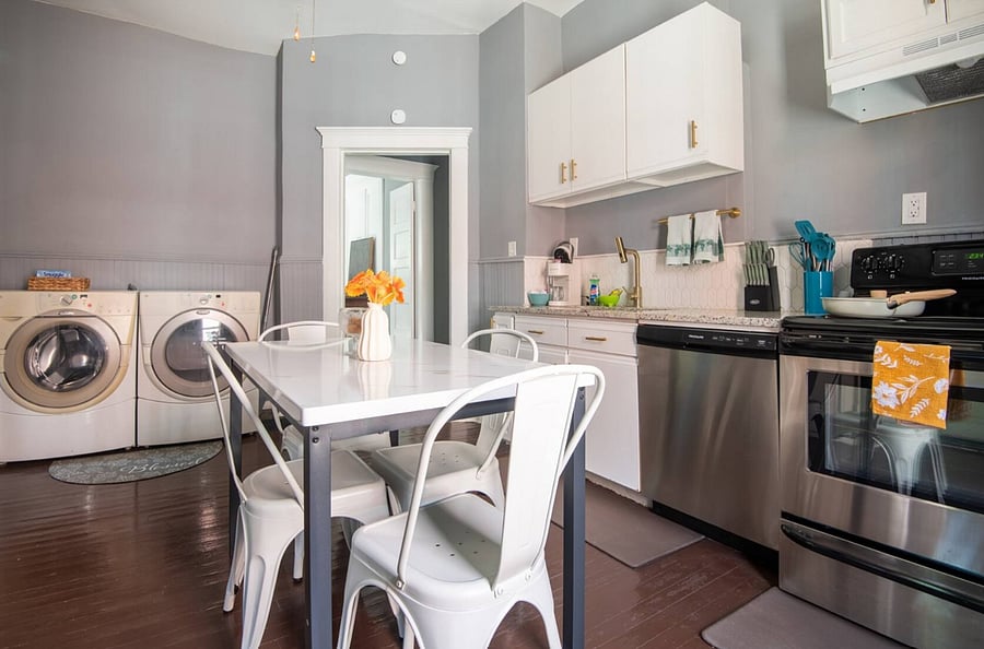 You'll love how open and functional this kitchen feels from the moment you walk in. Prepare meals with ease, then sit down and relax in the cozy dining space. The bright, clean design makes it a joy to spend time here.