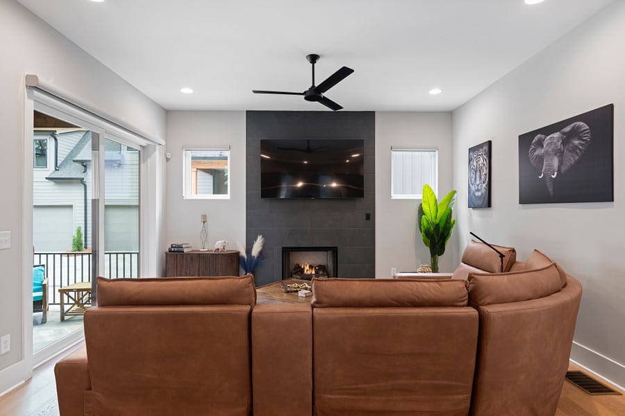 Living Room (Sectional, Air conditioning, Indoor fireplace, and TV)