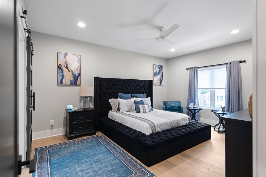 Bedroom 1 - King Bed (Air conditioning and Heating, Bed linens, Clothing storage, Hangers, and TV)