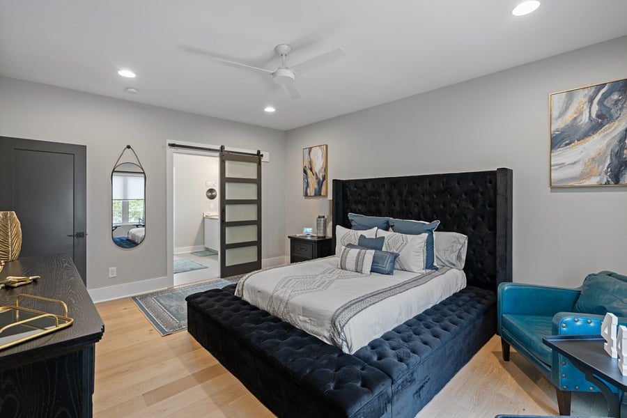 Bedroom 1 - King Bed (Air conditioning and Heating, Bed linens, Clothing storage, Hangers, and TV)