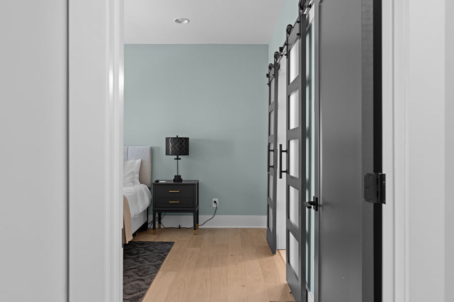 Bedroom 5 - King Bed (Air conditioning, Bed linens, Clothing storage, Hangers, Heating, and TV)