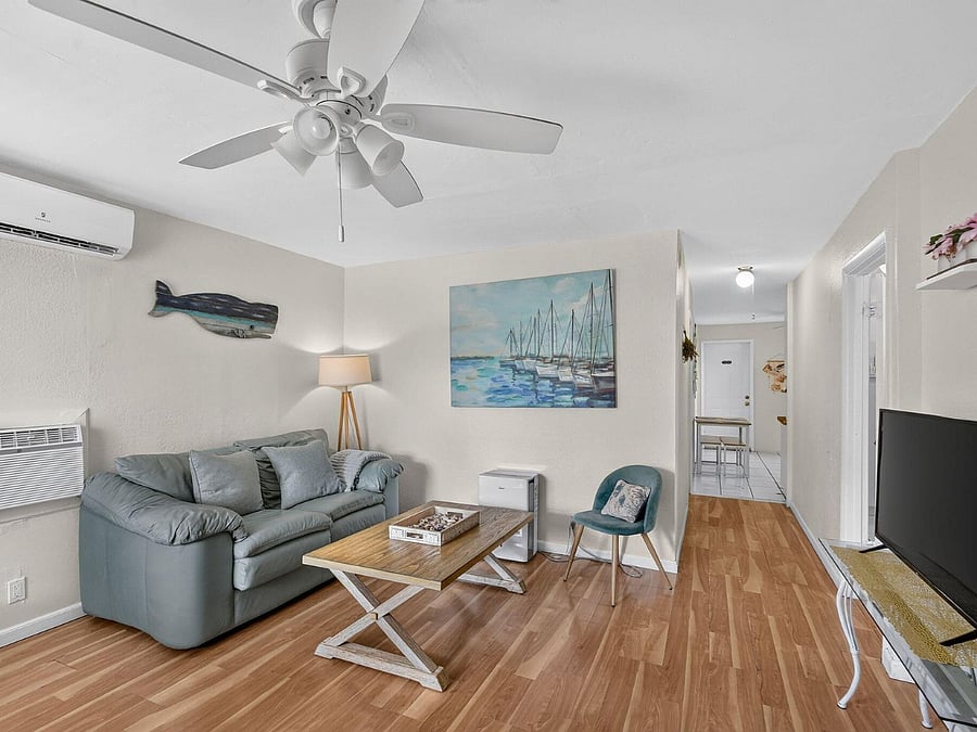 1/1 Livingroom
Offers a cozy, comfortable space with warm natural light, a Smart TV, and inviting seating-perfect for relaxing, unwinding, or enjoying quiet downtime during your stay.