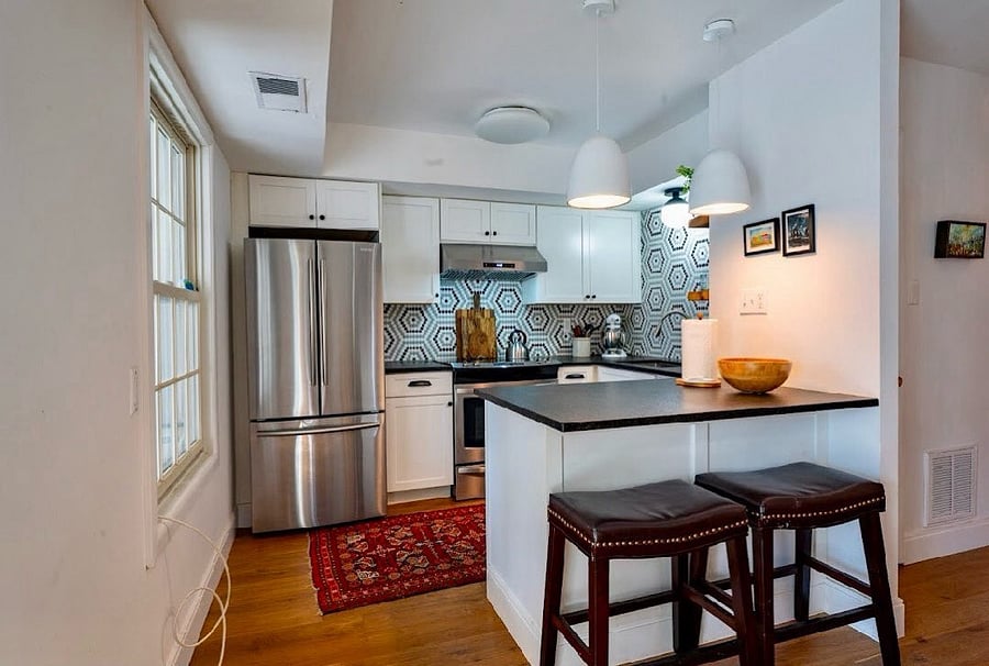 Lots of counter space and a great seating area to talk to the cook.