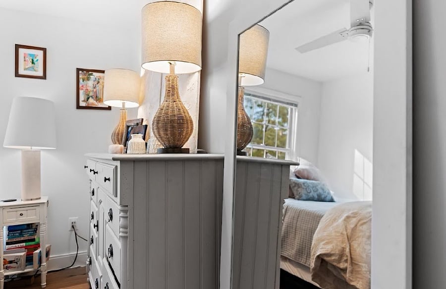 Another large mirror in the second bedroom.
