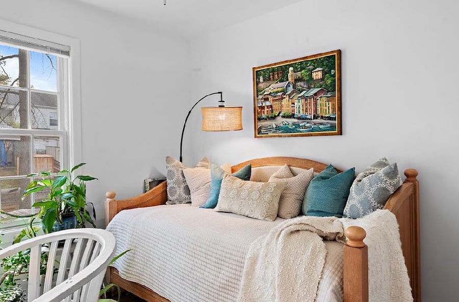 Third bedroom features a comfy day bed and desk.