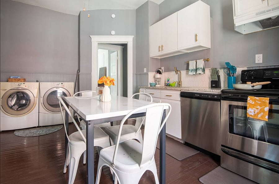 You'll love how open and functional this kitchen feels from the moment you walk in. Prepare meals with ease, then sit down and relax in the cozy dining space. The bright, clean design makes it a joy to spend time here.