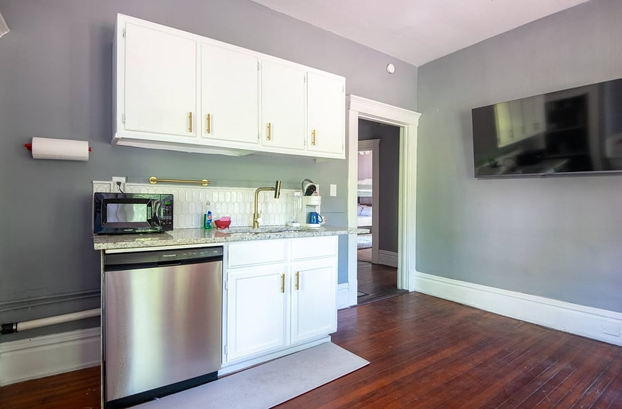 The kitchen comes with a full-size dishwasher and ample storage.