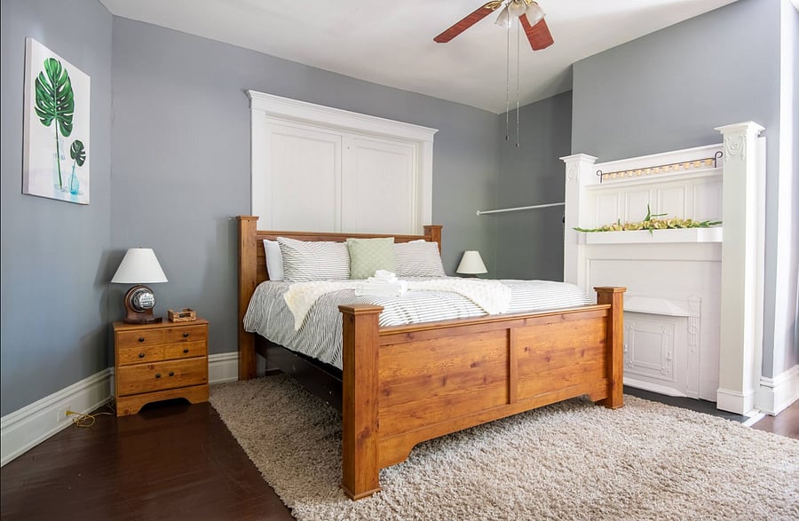 This queen bedroom is your perfect little sanctuary. Plush bedding, warm lighting, and a cozy vibe make it ideal for relaxing after a day out.