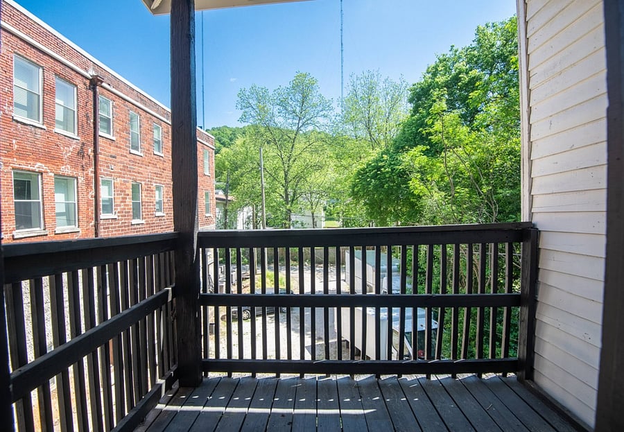 Pull up a chair and enjoy some quiet time on the back porch.