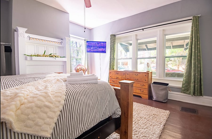 Enjoy a sunlit queen bedroom where natural light fills the room, giving you a calm and refreshing space to wake up in.