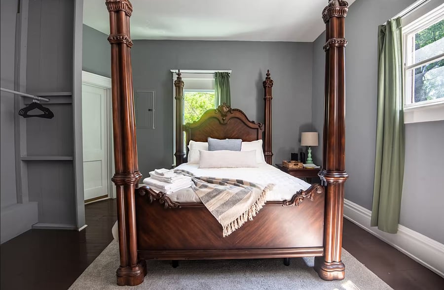 Further through the home, you can unwind on a queen bed designed for comfort, relaxation, and a restful night's sleep.