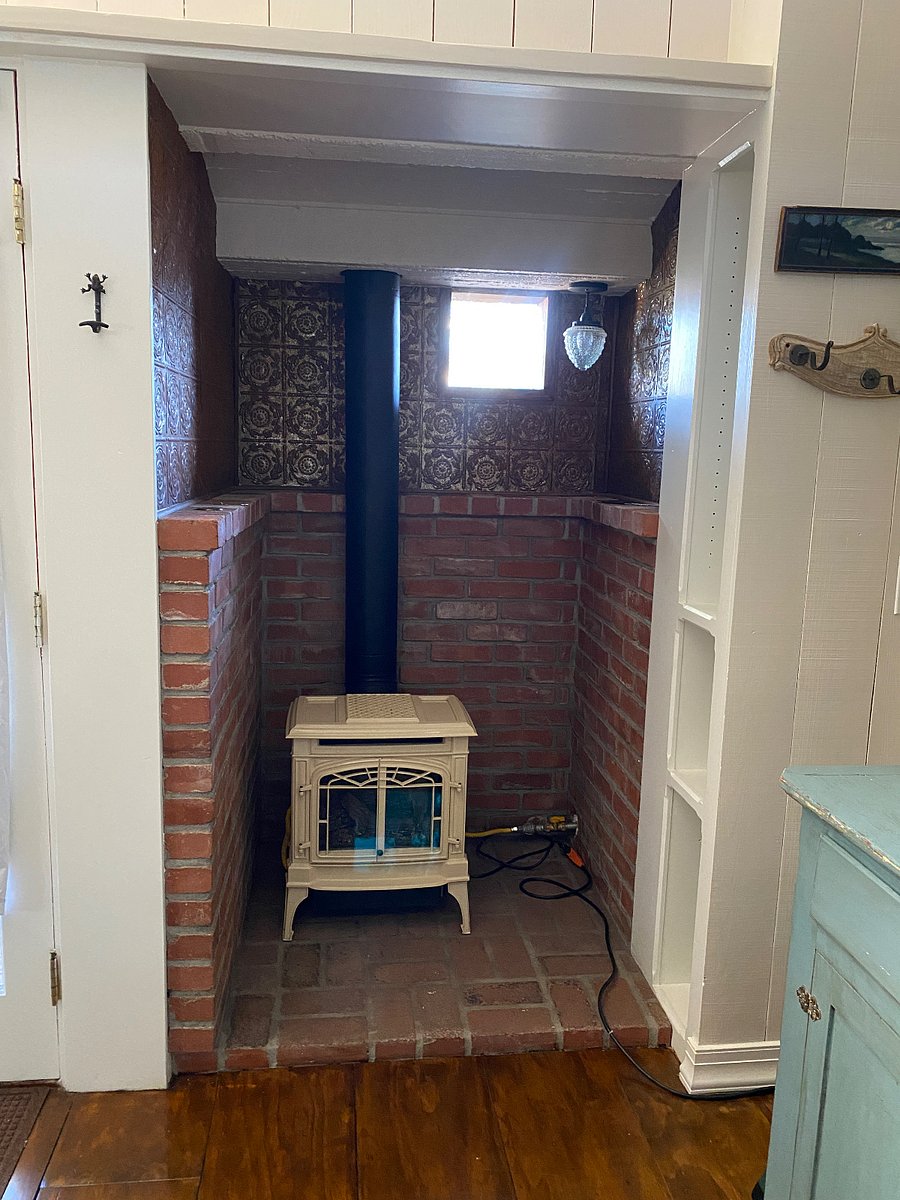 Heat is provided via a propane stove.  The tank is full and when you leave, we will have it filled again and you will be given an invoice to pay. 