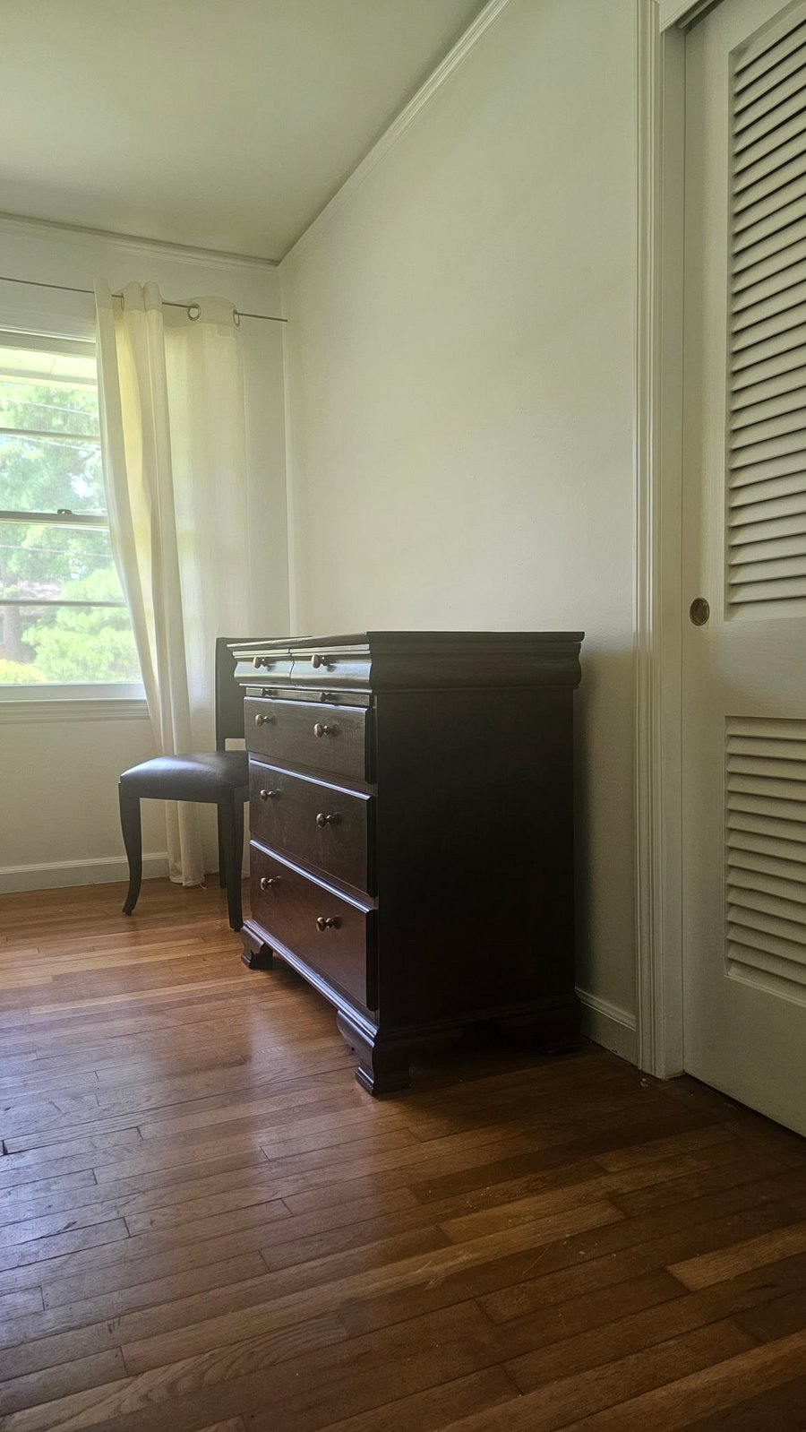 Generous dresser and closet space make it easy to unpack, organize your belongings, and feel at home during an extended stay.