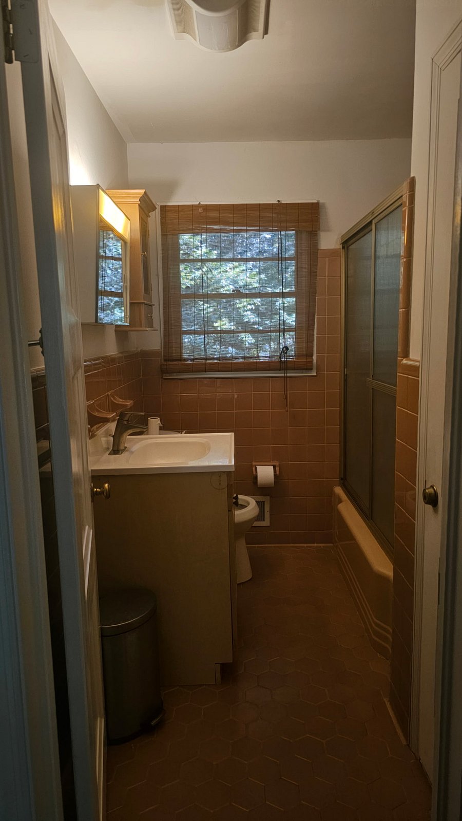 Private full bathroom with tub and shower, vanity, and natural light-everything you need for your daily routine.