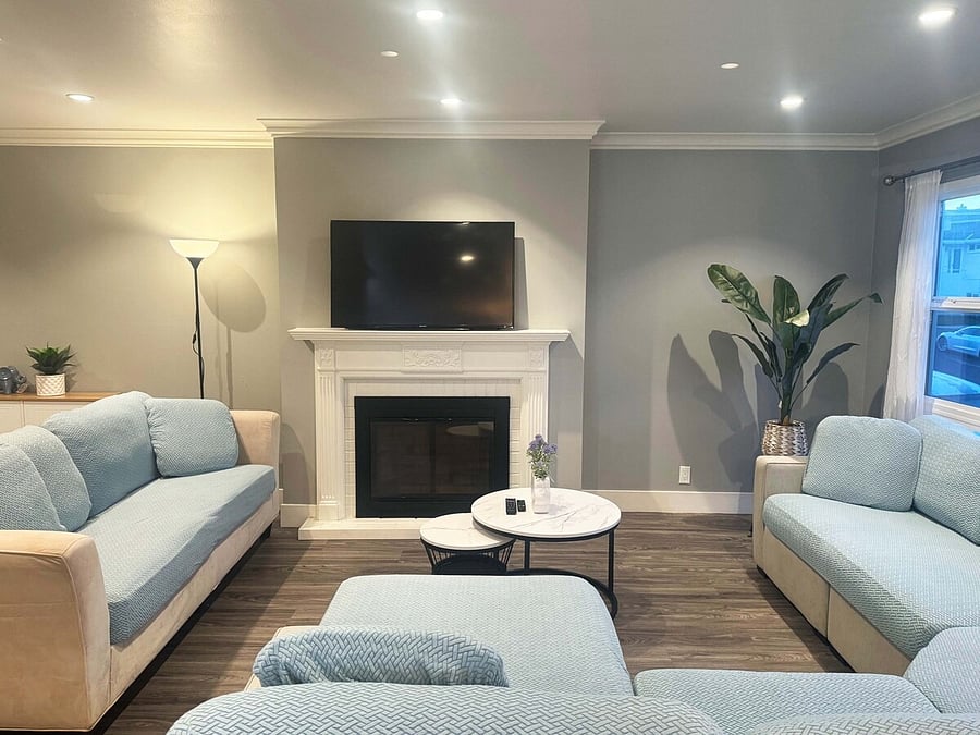 Comfortable living area with TV and fireplace