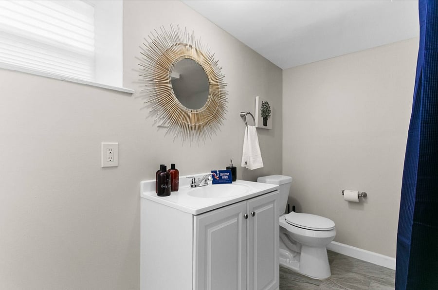 Refresh and recharge in a clean, fully stocked bathroom featuring a convenient stand-up shower and all the essentials for your stay.