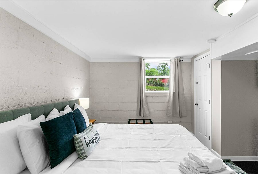 Settle into a plush queen bed and enjoy a peaceful setup that makes it easy to relax, stretch out, and feel at home.
