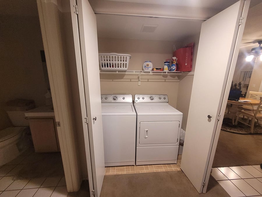 Washer and Dryer across from Bedroom