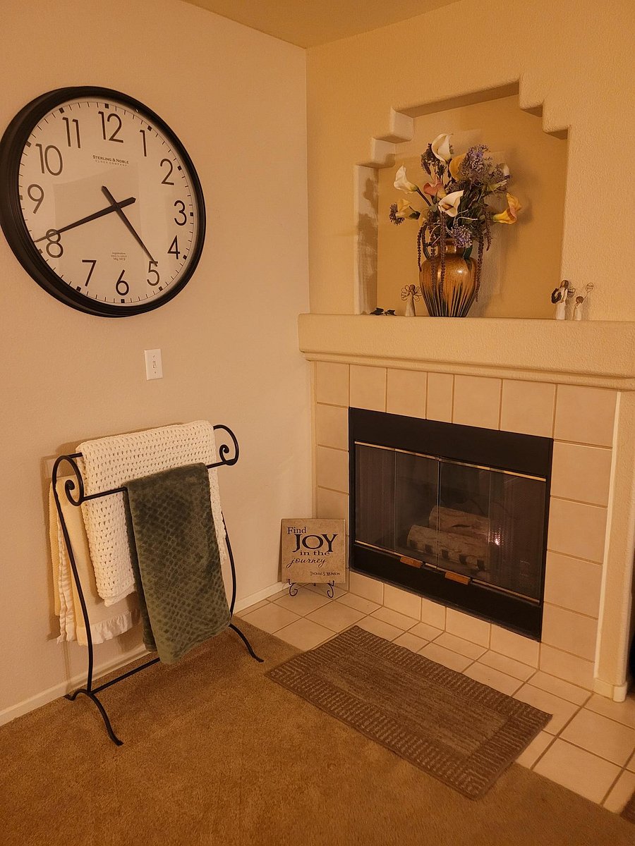 Living Room 1 of 3
Cozy beautifully decorated living room provides a peaceful, relaxing space to watch TV and/or unwind