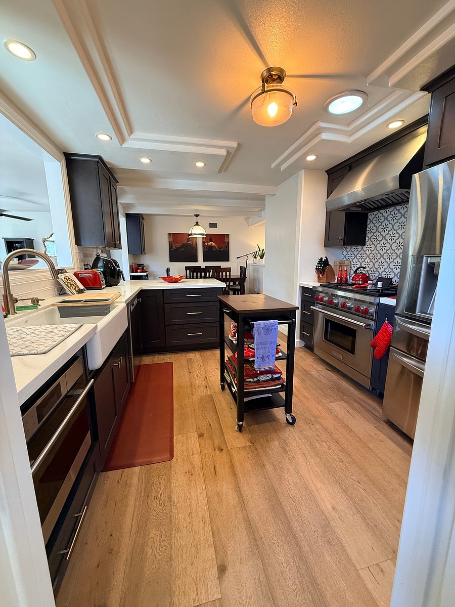 View of kitchen from laundry room. Fully equipped chef's kitchen!
