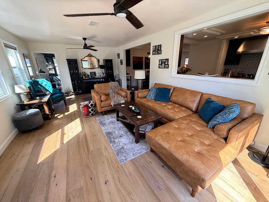 Closer view on new living room furniture and access into the kitchen
