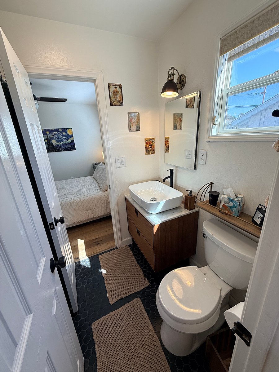 Located off the laundry room, the entrance to the en-suite bathroom and rental bedroom.