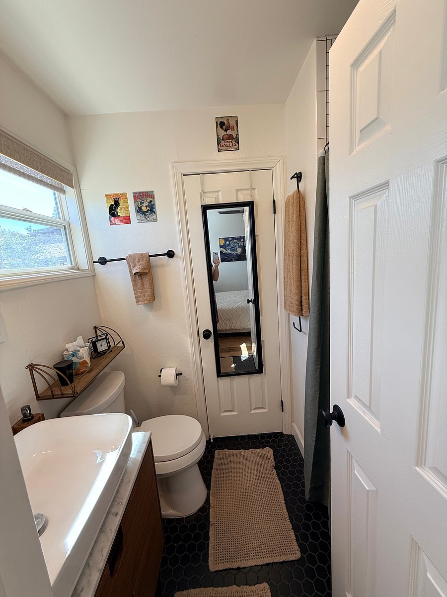 View of en-suite bathroom from the bedroom side.