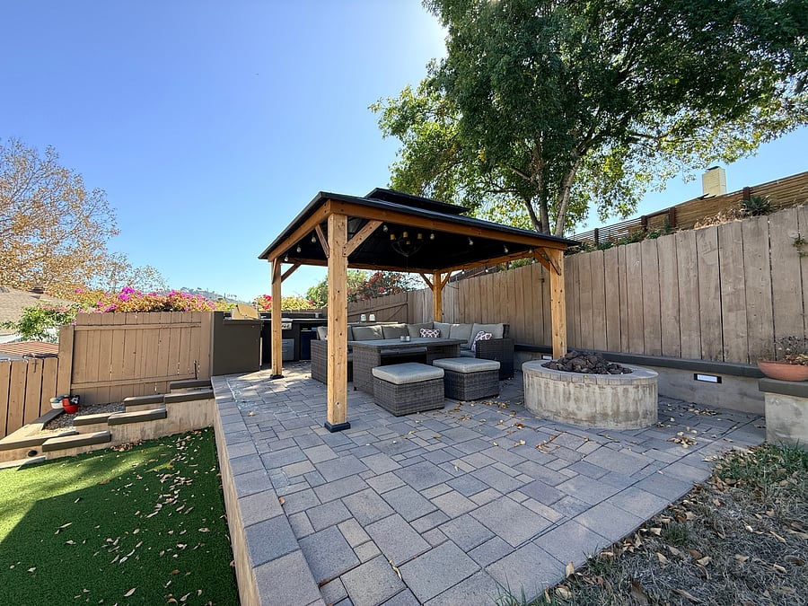 Fire pit and furnished patio area make a great space for year round outdoor living.