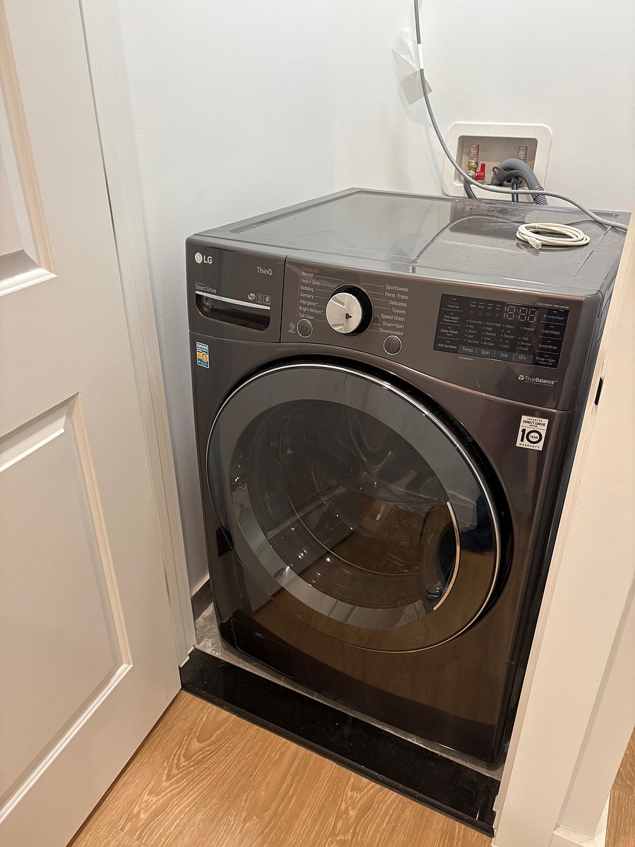 In-unit all-in-one washer/dryer combo.