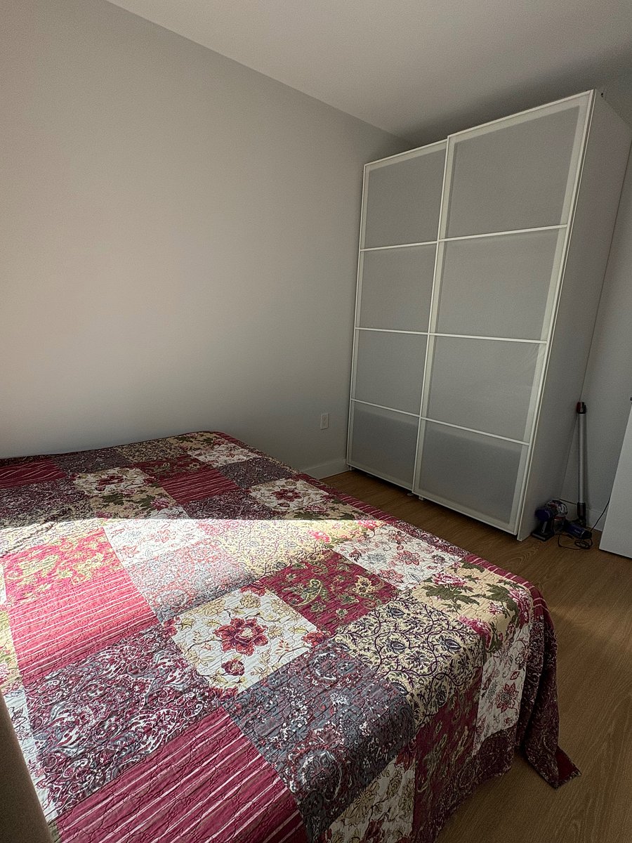 Bedroom with dress closet