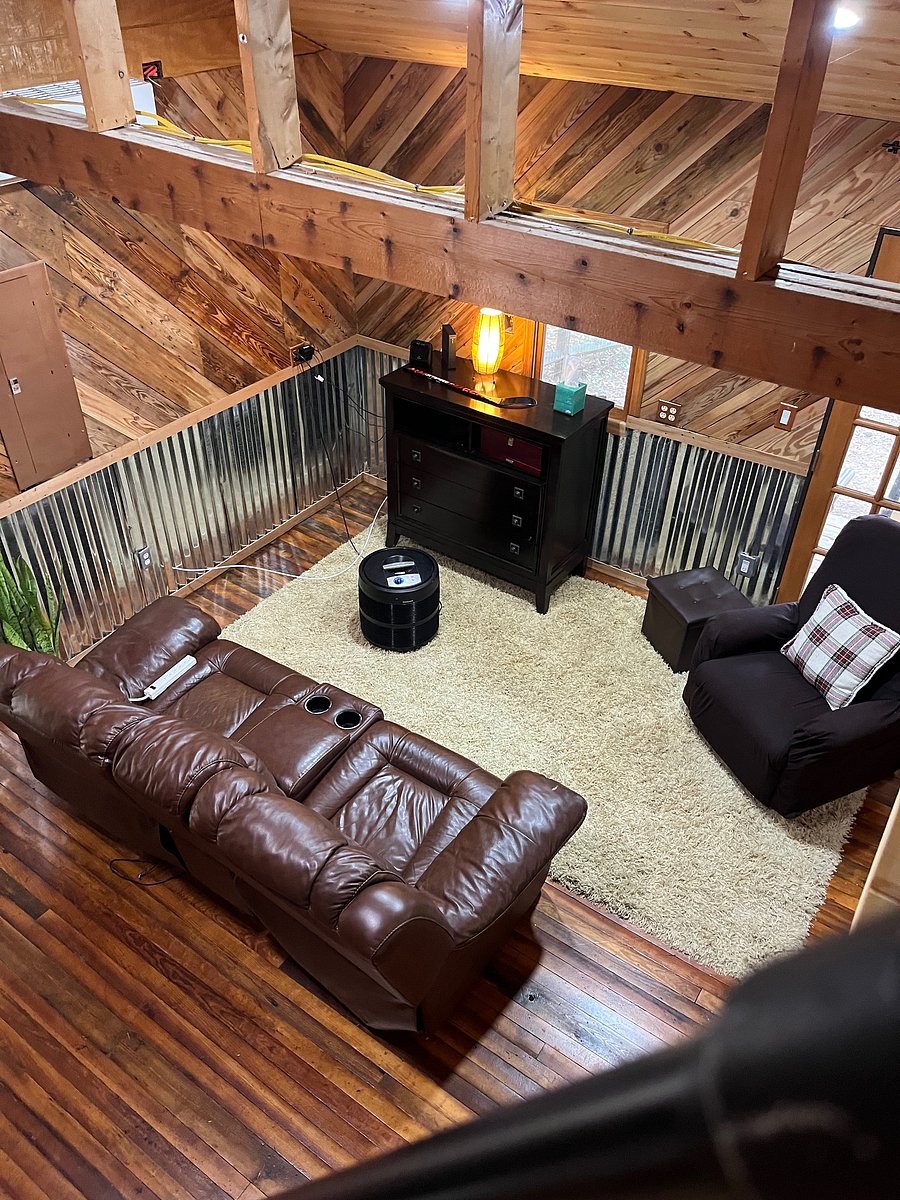 Leather reclining couch
45" smart tv with Roku surround sound speakers. Another recliner. And dresser for storage.