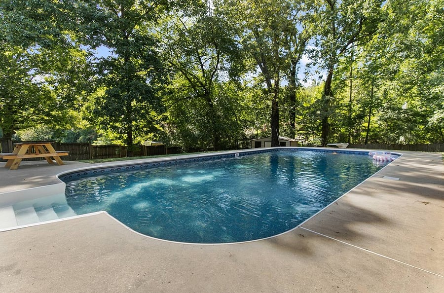 Framed by open space and thoughtful seating, the pool area creates an easygoing atmosphere where guests can gather, unwind, and enjoy the outdoors at their own pace.