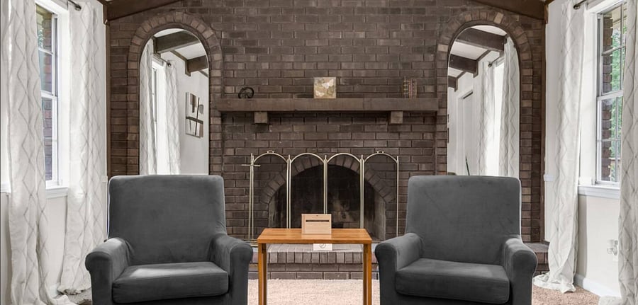 A decorative fireplace adds a warm, inviting touch to the space, creating a cozy atmosphere that makes it easy to settle in and feel at home.