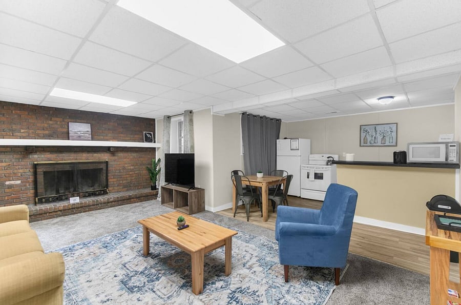 Just off the downstairs living area, this cozy dining space for four creates an easy flow between lounging and gathering. With the kitchen just steps away, it's perfect for casual meals, quick bites, or late-night conversations.