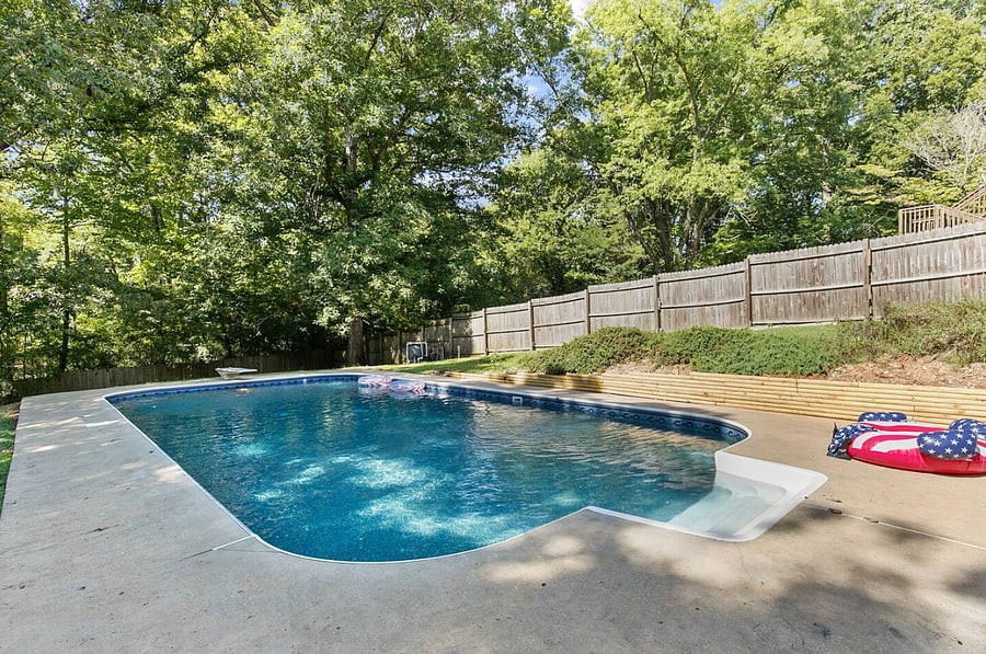 Whether it's an afternoon swim or an evening wind-down, the pool offers a refreshing escape, set within a generous backyard designed for both relaxation and connection.