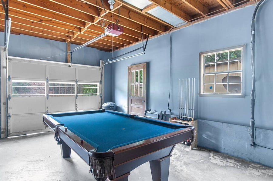 The pool table sets the scene for laid-back game nights and a little friendly competition-an easy way to bring everyone together for laughs, connection, and a break from the day's activities.
