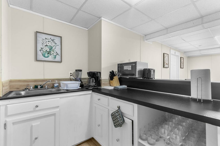 Perfect for extended stays or larger groups, this additional kitchen makes it easy to spread out and cook with ease. Its simple, functional layout keeps everything within reach for a smooth, no-fuss experience.