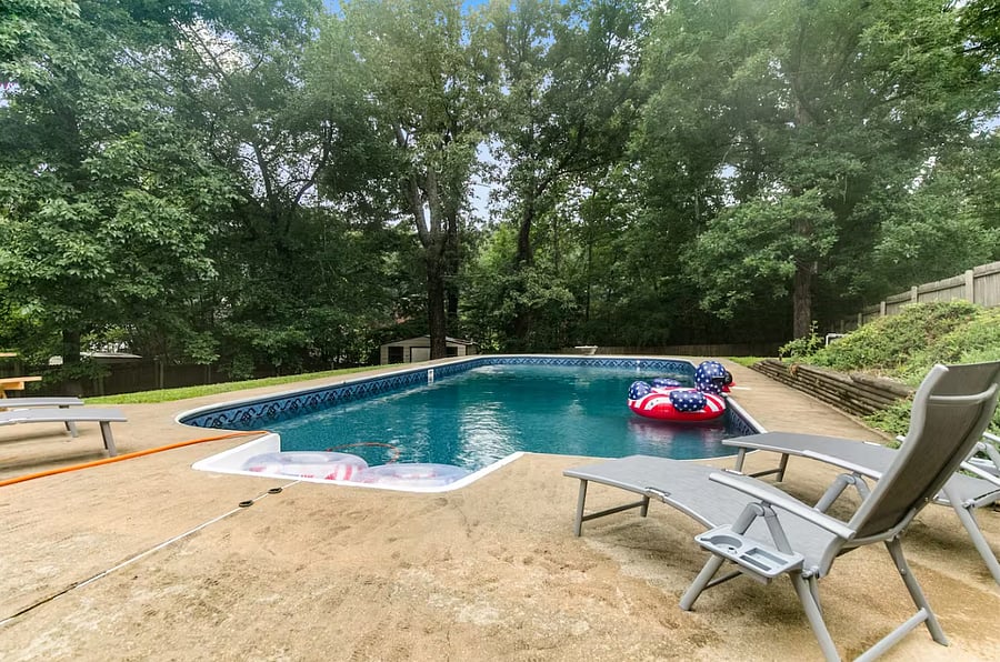 Stretch out on the sun loungers and take in the peaceful setting, surrounded by a large, fully fenced backyard that offers both privacy and plenty of room to relax.