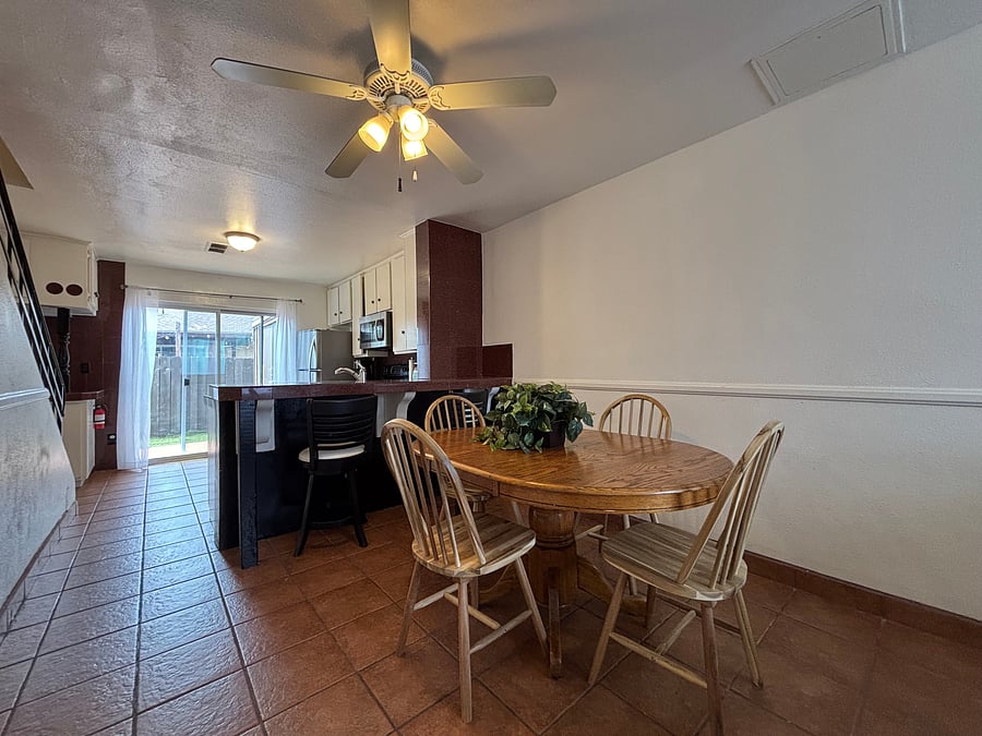 Kitchen breakfast bar with seating for two-perfect for morning coffee or a casual meal.