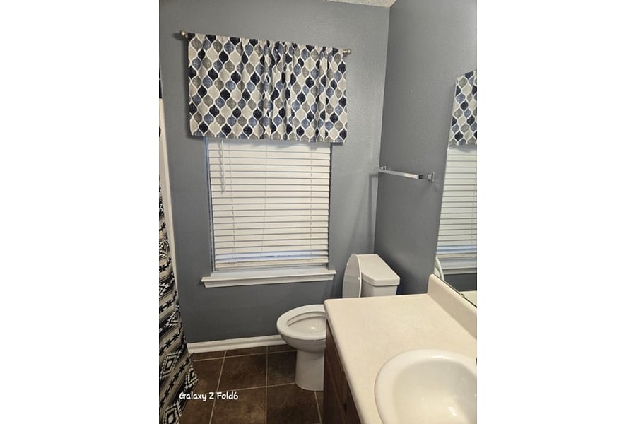 Upper level shared bathroom