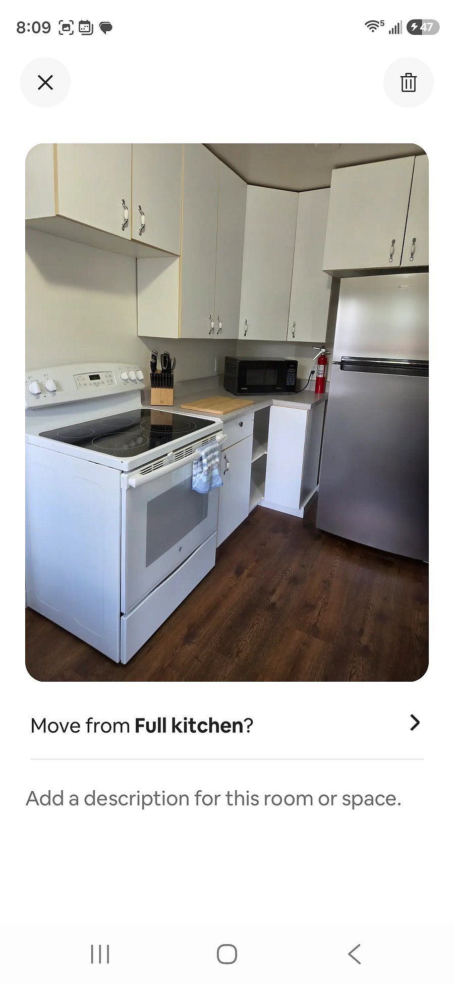 New refrigerator and flooring for kitchen and utility room.