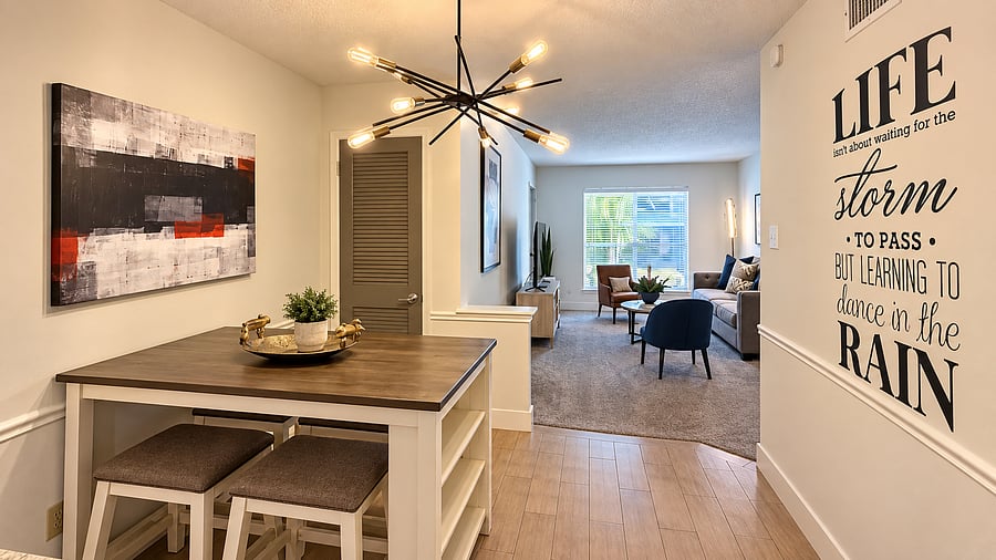Charming dining nook just off the kitchen with comfortable seating and an open connection to the living area-perfect for meals, coffee, or working from home.