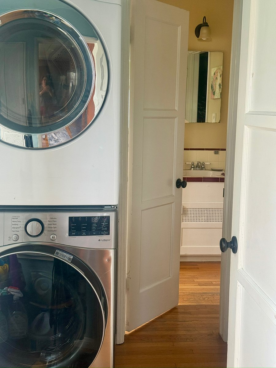 Laundry room off the kitchen and the private bathroom.