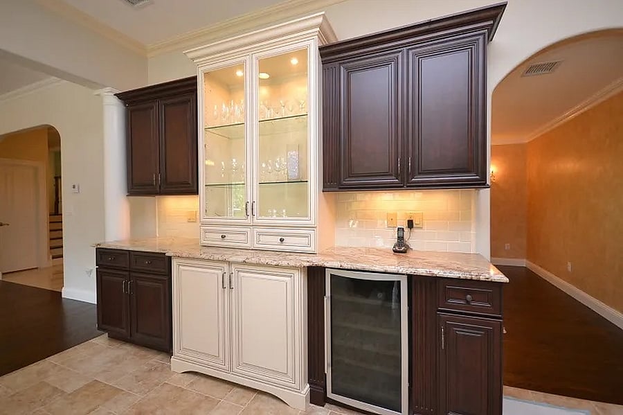 Granite counters w/wine fridge in kitchen