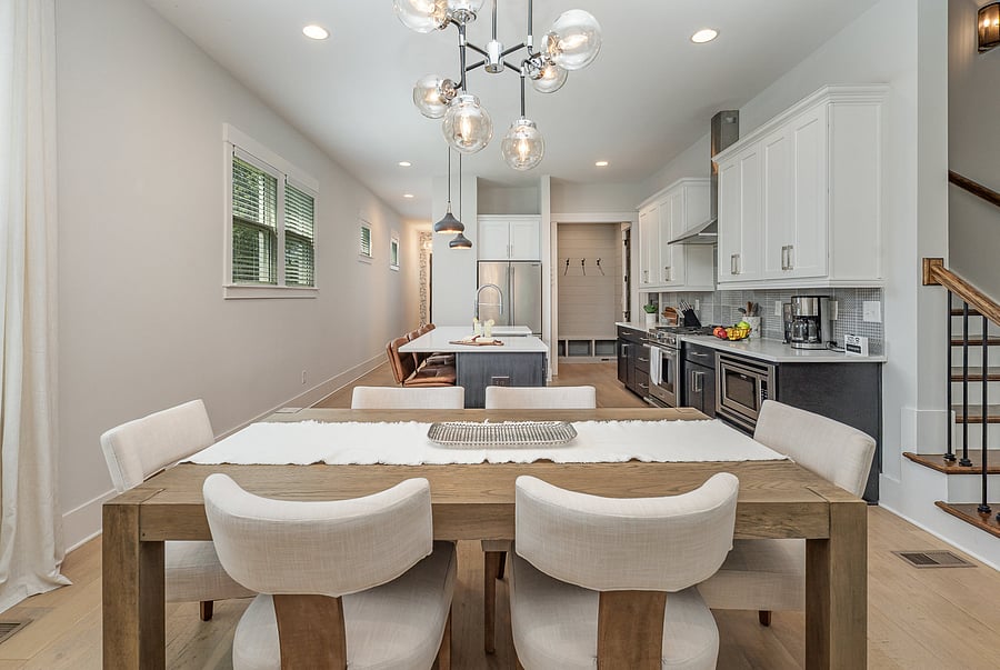 Dining area conveniently located in the kitchen, featuring a table with comfortable seating for six.