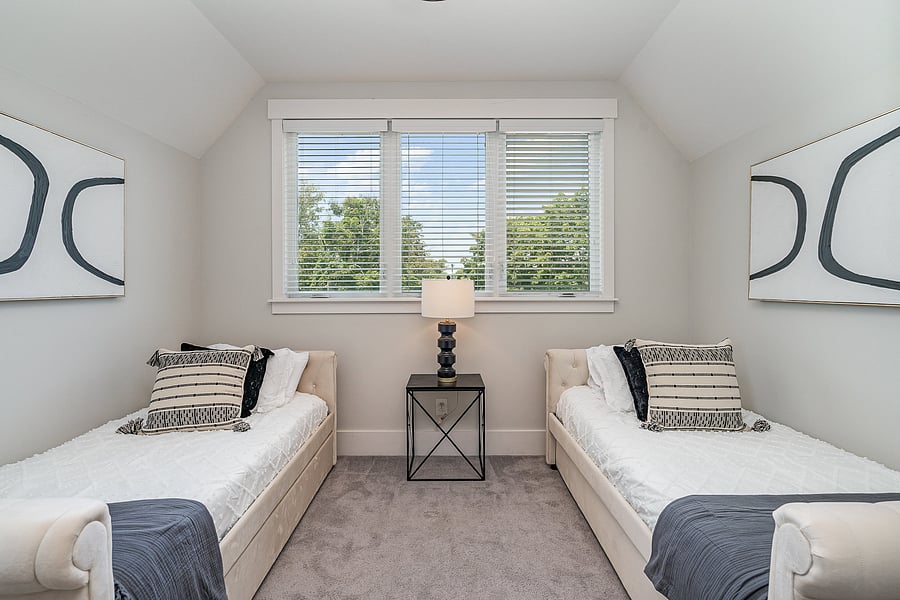 Additional living room on the 3rd floor with attached bathroom, Smart TV, and 2 twin beds.