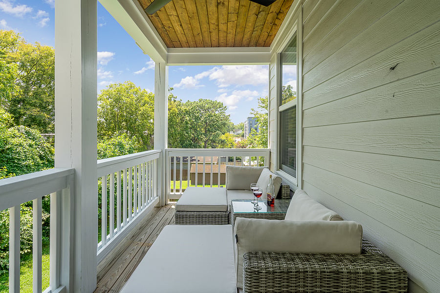 Second private deck with outdoor furniture connected to bedroom 1.