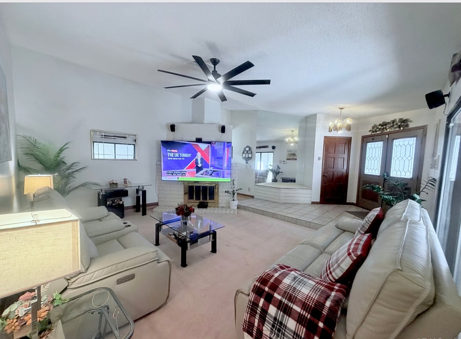 Your post- shift with relaxation zone. Enjoy the movie night on the large 85" screen from the comfort leather couches of push reclining sofas in a sun- drenched open layout