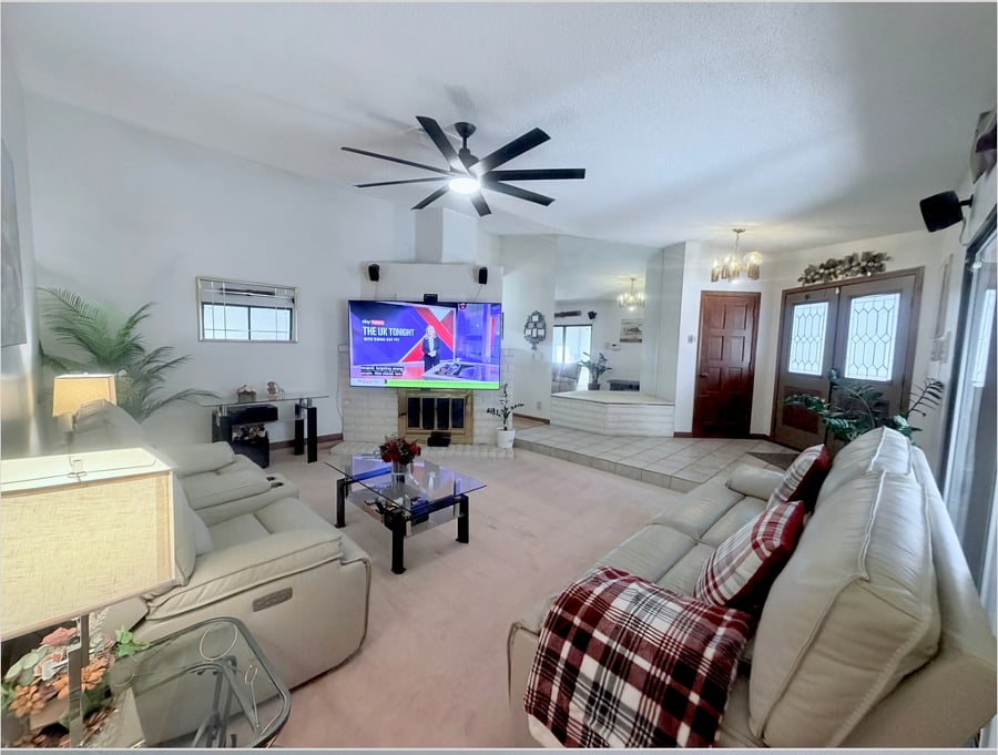 Your post- shift with relaxation zone. Enjoy the movie night on the large 85" screen from the comfort leather couches of push reclining sofas in a sun- drenched open layout.