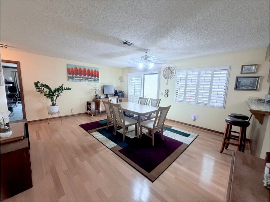 Dedicated dinning area that doubles as a quiet workspace, complete with an office desk, printer, high-speed Wi-Fi access, bright natural lighting. Spacious dining room with 6 chairs and table